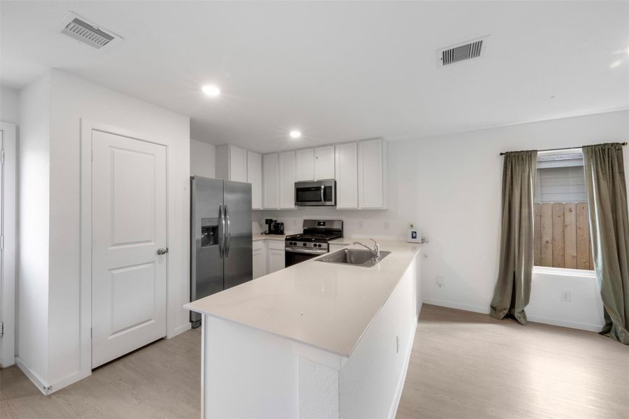 Furnished interior view inside a new home in , New Caney (Image 8).