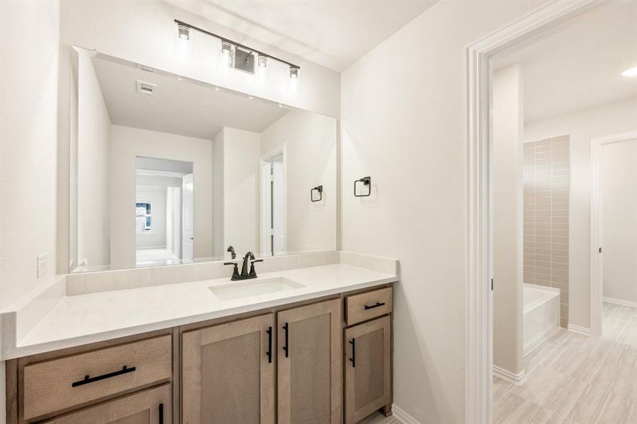 Furnished interior view inside a new home in Woodstone, Providence Village (Image 13).