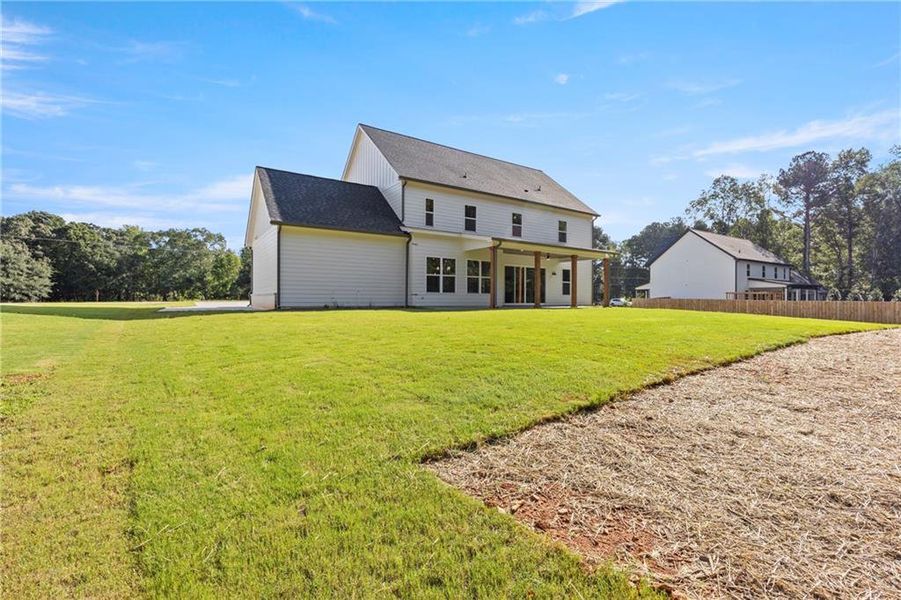 Front exterior of a new home in , Winder, GA, highlighting curb appeal (Image 26).