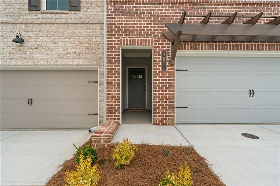Front exterior of a new home in Wilkins Walk, Mableton, GA, highlighting curb appeal (Image 17).
