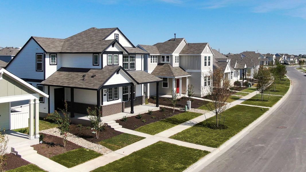 Front exterior of a new home in Casetta Ranch, Kyle, TX, highlighting curb appeal (Image 15).