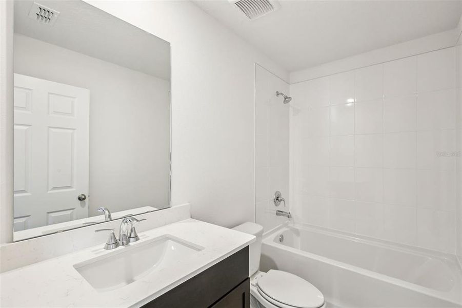 Furnished interior view inside a new home in Springs at Lake Alfred - Classic Series, Lake Alfred (Image 12).