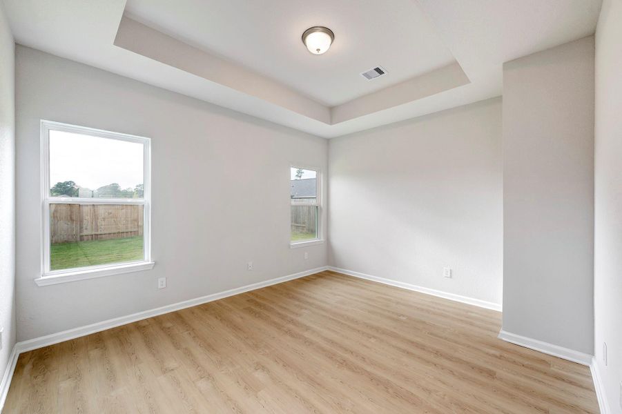 The Davenport II- Primary Bedroom with Tray Ceiling. Sample floor plan photo used for illustrative purposes only. Upgrades, selections options, and colors will vary. The Davenport II- Primary Bedroom with Tray Ceiling. Sample floor plan photo used for illustrative purposes only. Upgrades, selections options, and colors will vary.