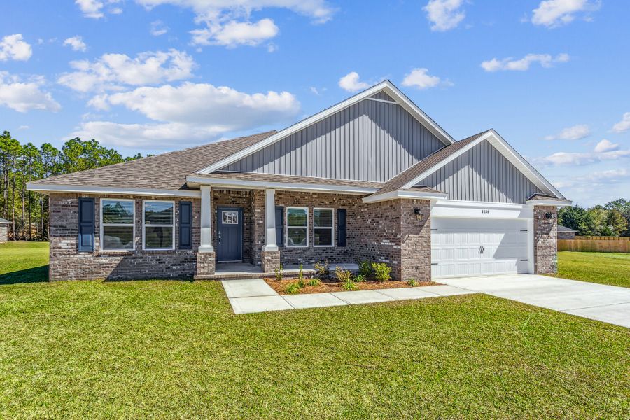 Representative exterior photo of a completed home built from the The Turquoise by Herbst Homes in Walther Reserve, Milton, FL (Image 38).
