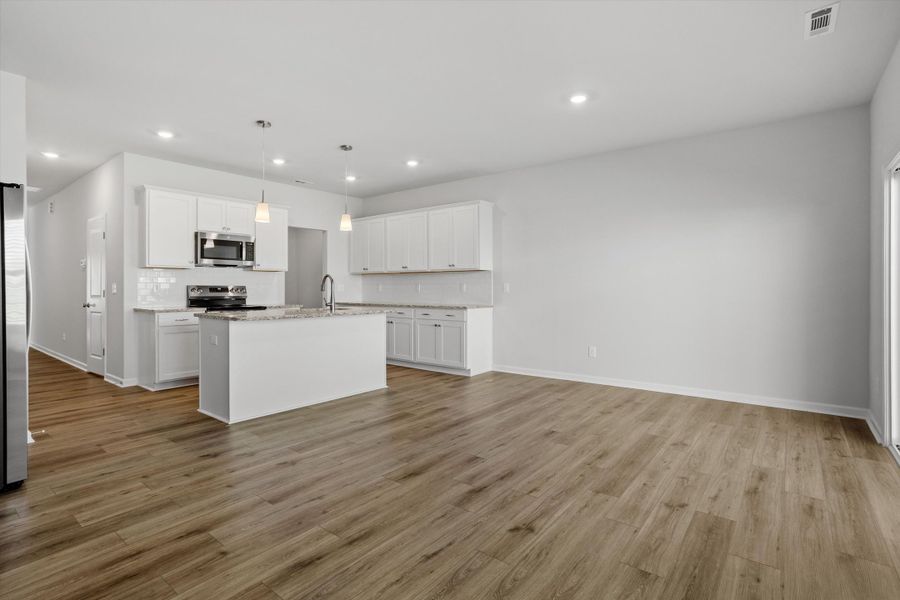 Spacious, unfurnished interior of a new home in West Main Townhomes, Sanford (Image 14).
