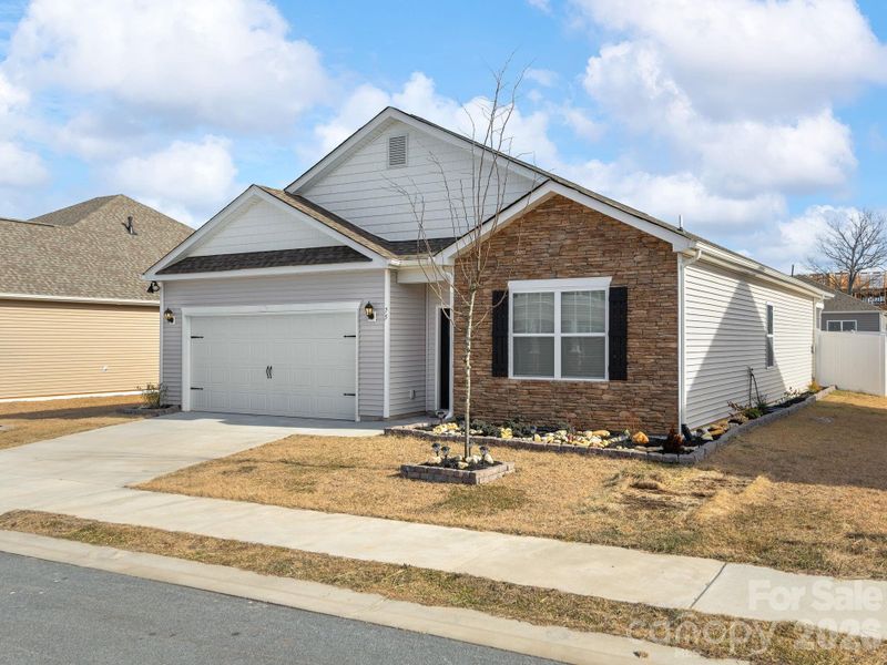 Front exterior of a new home in , Fletcher, NC, highlighting curb appeal (Image 21). Front exterior of a new home in , Fletcher, NC, highlighting curb appeal (Image 21).