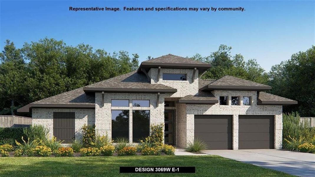 Prairie-style house featuring a garage and a front yard