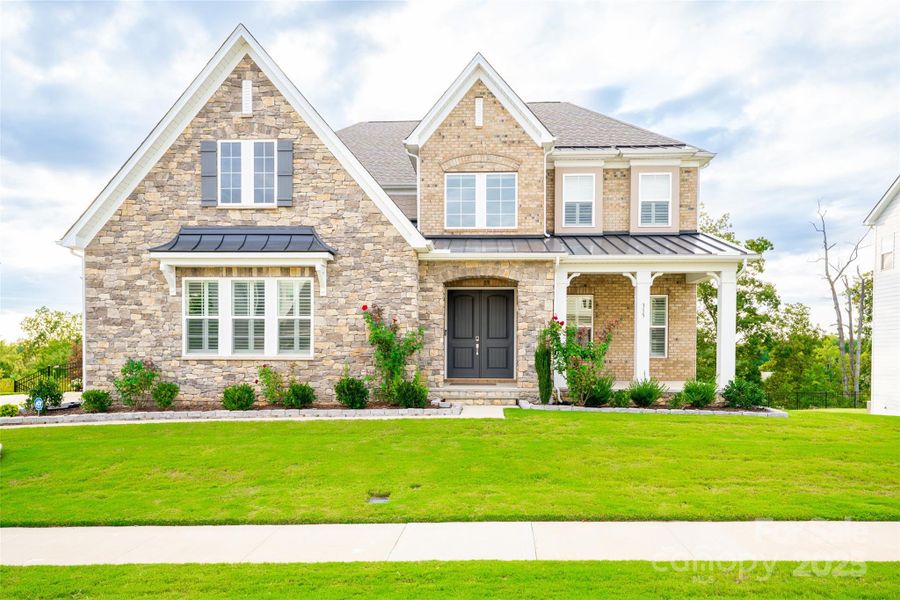 Front exterior of a new home in , Mooresville, NC, highlighting curb appeal (Image 1). Front exterior of a new home in , Mooresville, NC, highlighting curb appeal (Image 1).