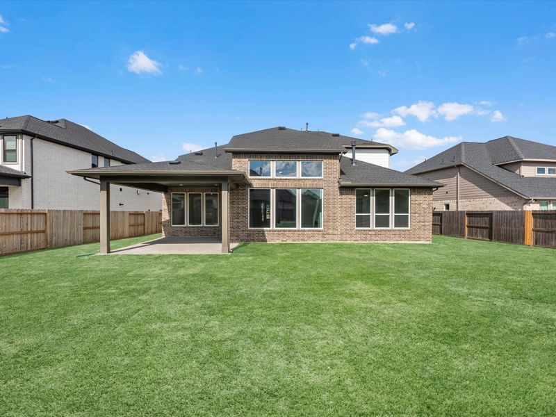 Exterior details and patio area of a home in Cross Creek Ranch 65′, Fulshear (Image 3).