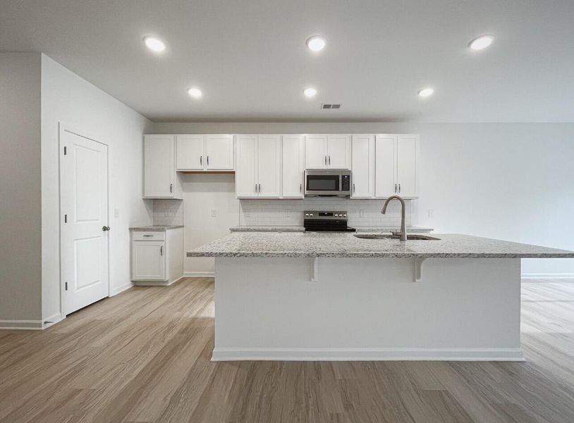 Furnished interior view inside a new home in East Main Townes, Spartanburg (Image 6).