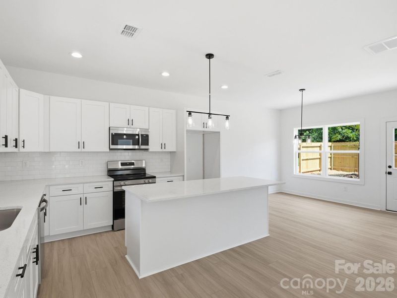 Furnished interior view inside a new home in , Charlotte (Image 9).