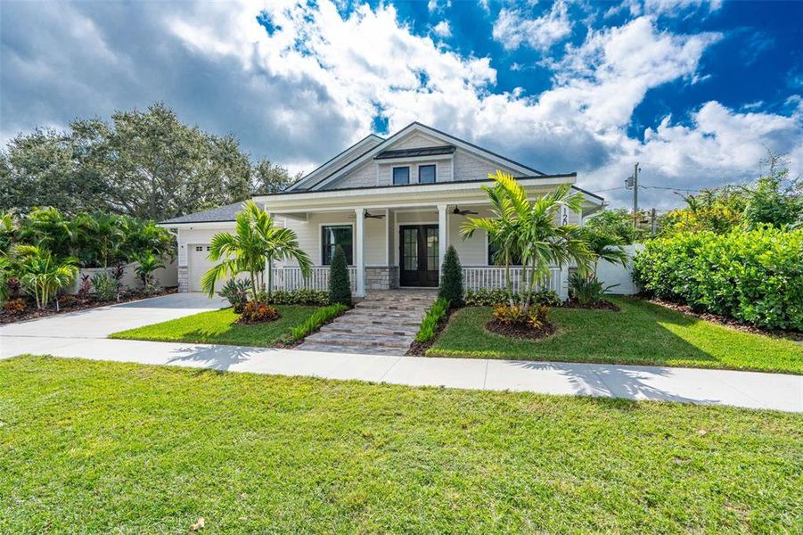 Front exterior of a new home in , Safety Harbor, FL, highlighting curb appeal (Image 26). Front exterior of a new home in , Safety Harbor, FL, highlighting curb appeal (Image 26).