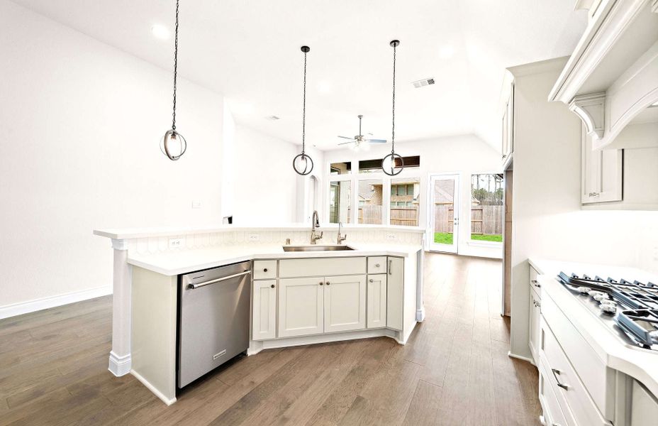 Representative furnished interior of a home built from the 2406 by Ravenna Homes in The Highlands 55′, Porter (Image 7).