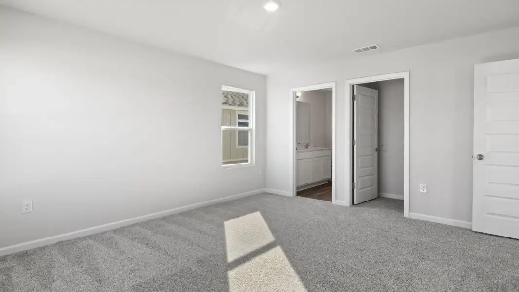 Spacious, unfurnished interior of a new home in Magnolia at the Bluffs Phase 3, Freeport (Image 20).