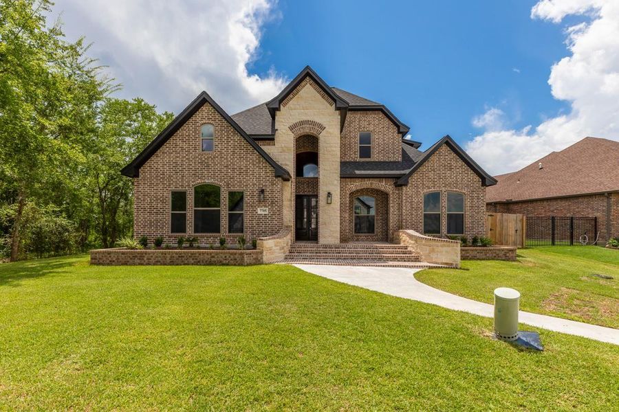 Front exterior of a new home in , Beaumont, TX, highlighting curb appeal (Image 19). Front exterior of a new home in , Beaumont, TX, highlighting curb appeal (Image 19).