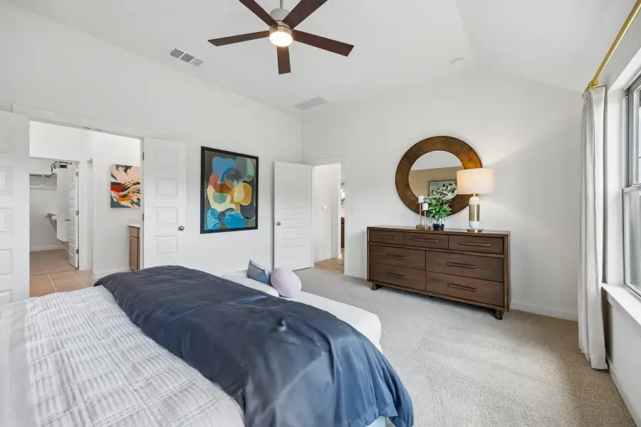 Primary Suite in the Pecos home plan by Trophy Signature Homes – REPRESENTATIVE PHOTO