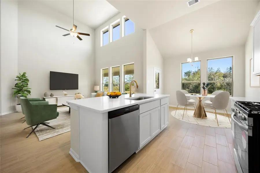 The heart of this home is the chef's kitchen! From the commanding vantage point of this spacious kitchen, one can appreciate the full scope of the open-concept living space. *Virtually Staged The heart of this home is the chef's kitchen! From the commanding vantage point of this spacious kitchen, one can appreciate the full scope of the open-concept living space. *Virtually Staged