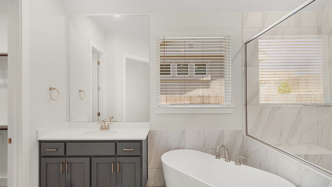 Representative furnished interior of a home built from the Brenner by Chesmar Homes in Newhaven, Manor (Image 14).