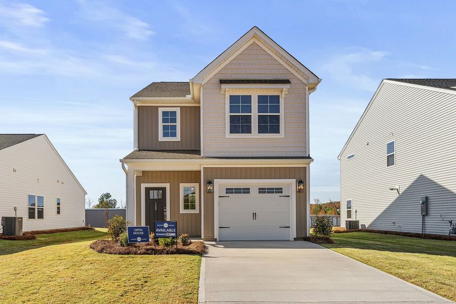 Front exterior of a new home in Tucker Ridge, Pendleton, SC, highlighting curb appeal (Image 1).