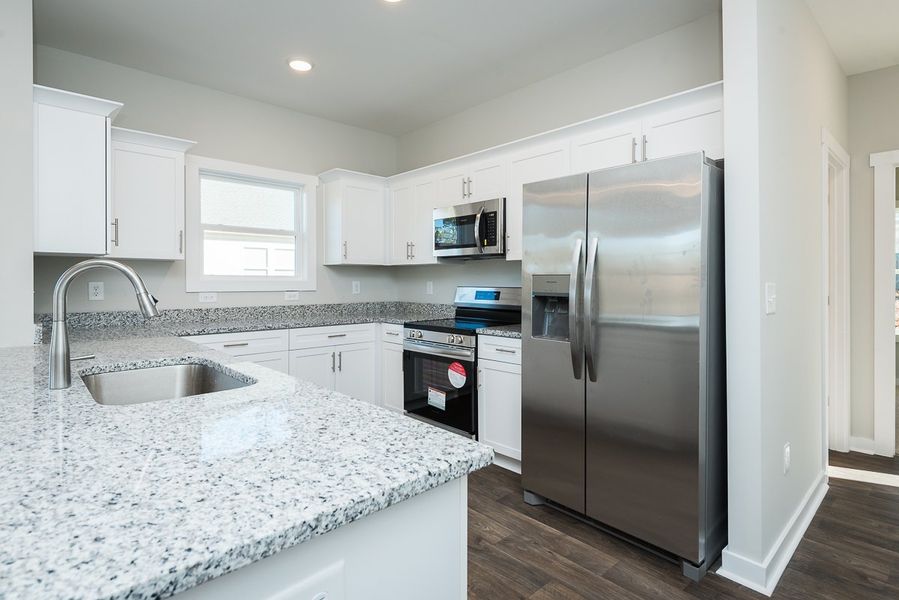 Representative furnished interior of a home built from the Monroe II by Foundation Home Builders LLC in Pinnix Loop, Burlington (Image 8).