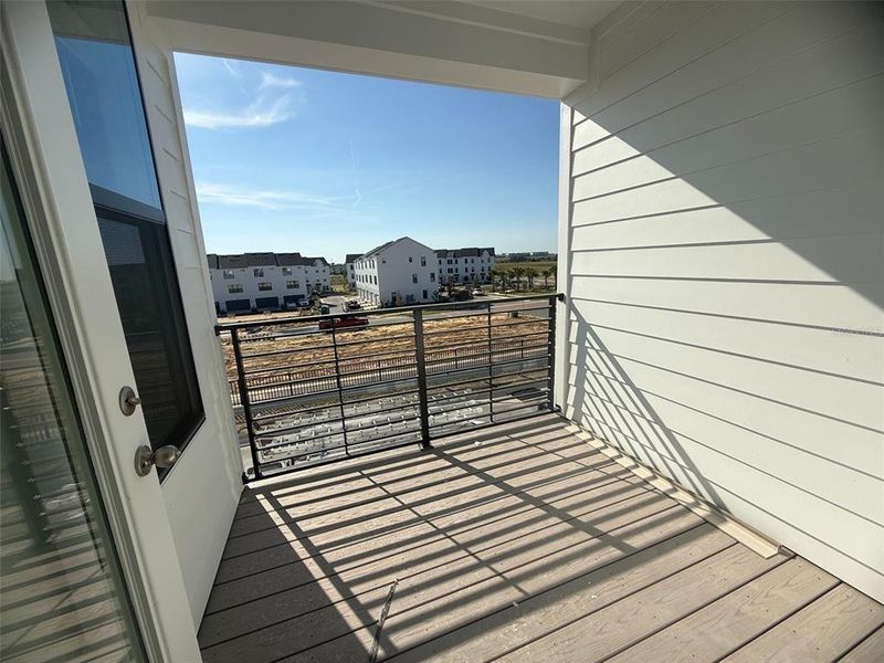 Exterior details and patio area of a home in Parkview at Hamlin, Winter Garden (Image 13).