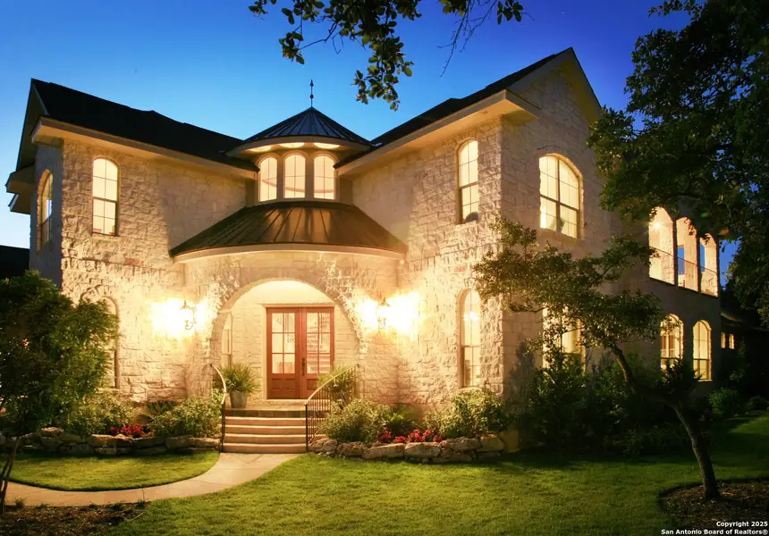 Front exterior of a new home in , McQueeney, TX, highlighting curb appeal (Image 1).
