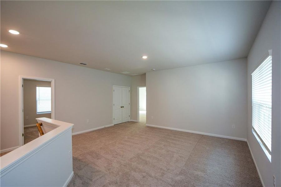 Spacious, unfurnished interior of a new home in Graystone Village, Grayson (Image 39).