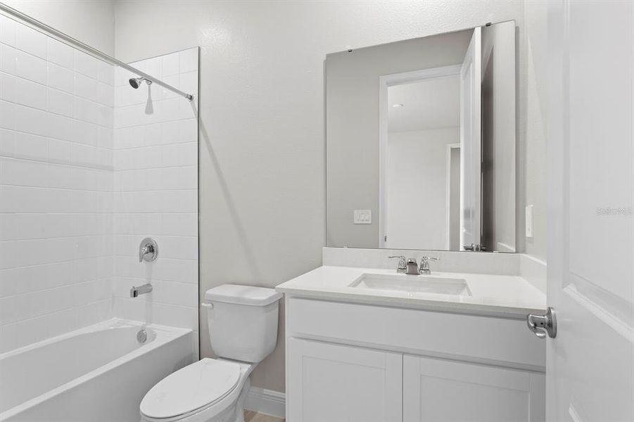 Furnished interior view inside a new home in Windwater, Parrish (Image 28).