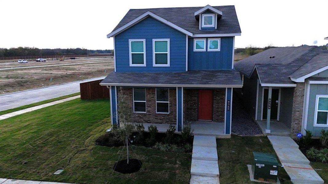 Front exterior of a new home in Orchard Village, Fort Worth, TX, highlighting curb appeal (Image 2).