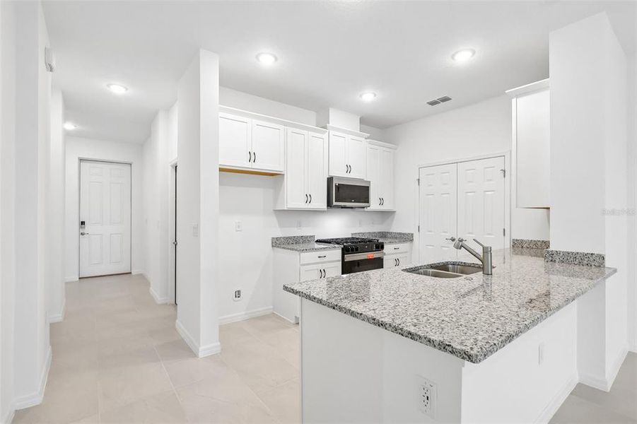Furnished interior view inside a new home in Eagletail Landings, Howey-in-the-Hills (Image 12).