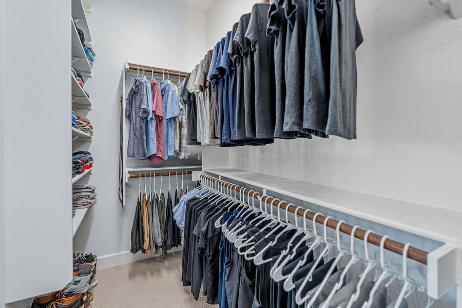 Walk in closet with light carpet Walk in closet with light carpet