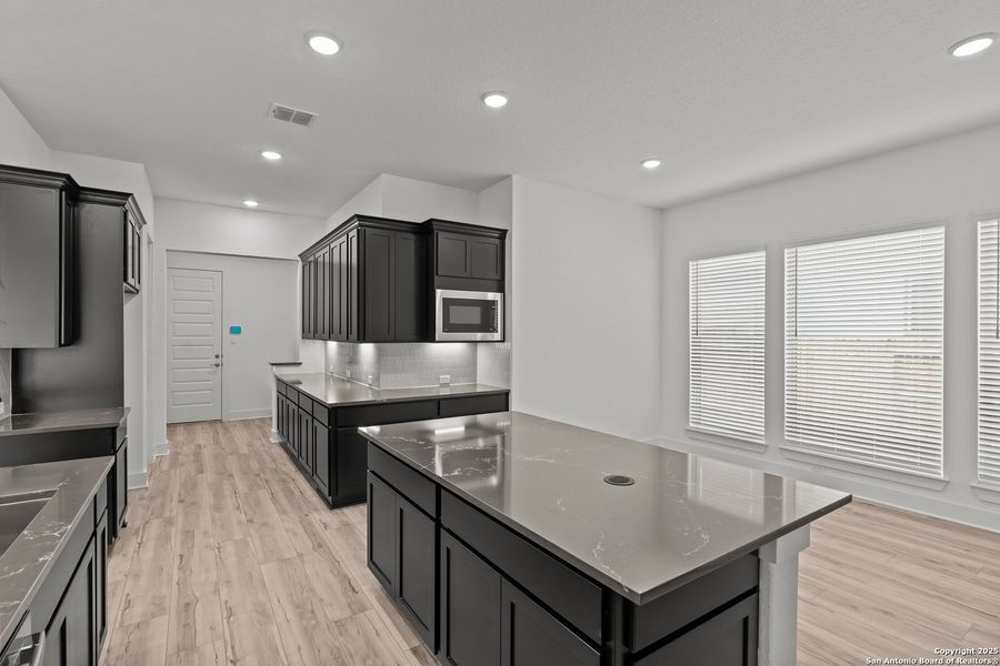 Furnished interior view inside a new home in Mesa Western, Cibolo (Image 9). Furnished interior view inside a new home in Mesa Western, Cibolo (Image 9).