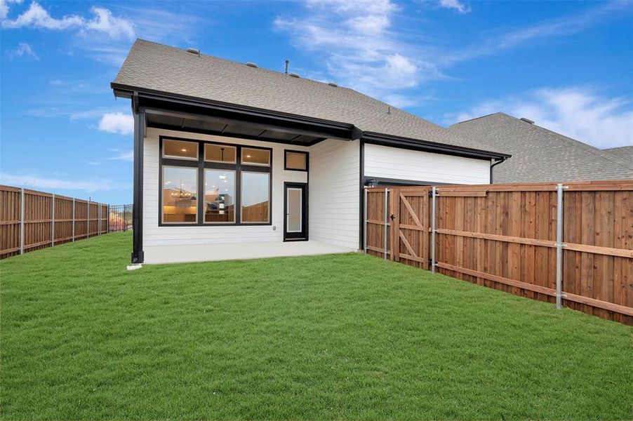 Exterior details and patio area of a home in Karis - Village Series, Crowley (Image 3).