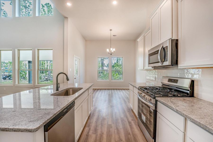 Furnished interior view inside a new home in Deer Pines, Conroe (Image 6).