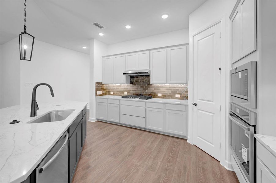 Furnished interior view inside a new home in Riceland 50’ Alley Load Homesites, Mont Belvieu (Image 7).