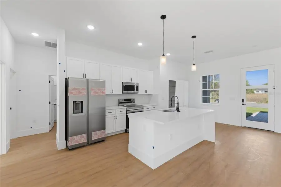 Furnished interior view inside a new home in , Ocala (Image 7).