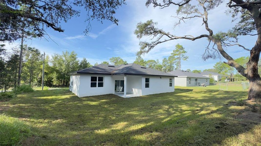 Front exterior of a new home in , Citrus Springs, FL, highlighting curb appeal (Image 21). Front exterior of a new home in , Citrus Springs, FL, highlighting curb appeal (Image 21).