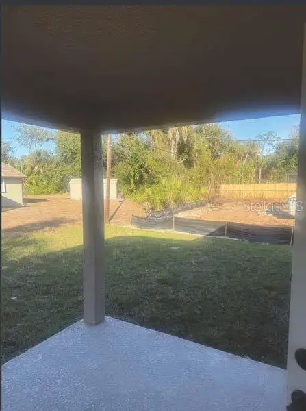 Exterior details and patio area of a home in , Port Charlotte (Image 3).