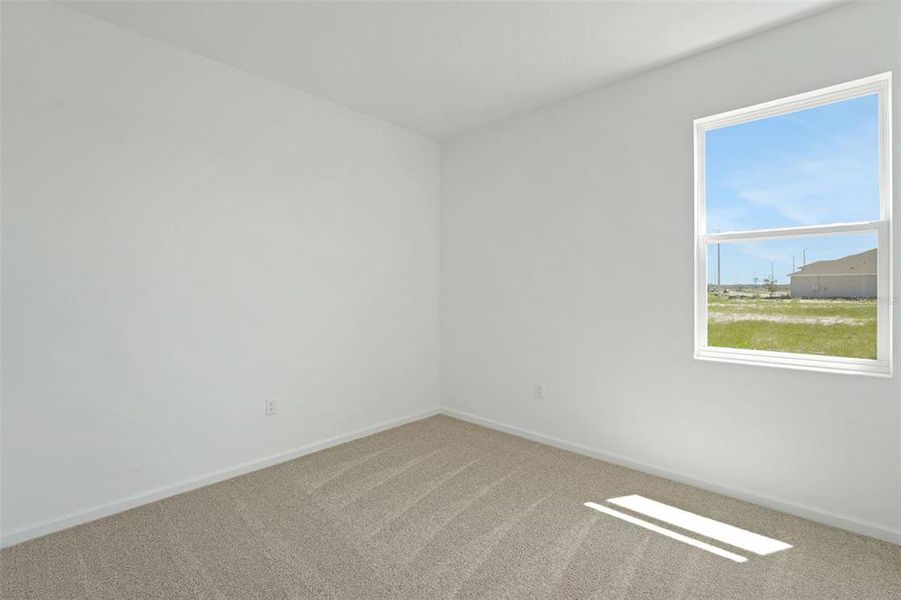 Spacious, unfurnished interior of a new home in Willowbrook North, Winter Haven (Image 27).