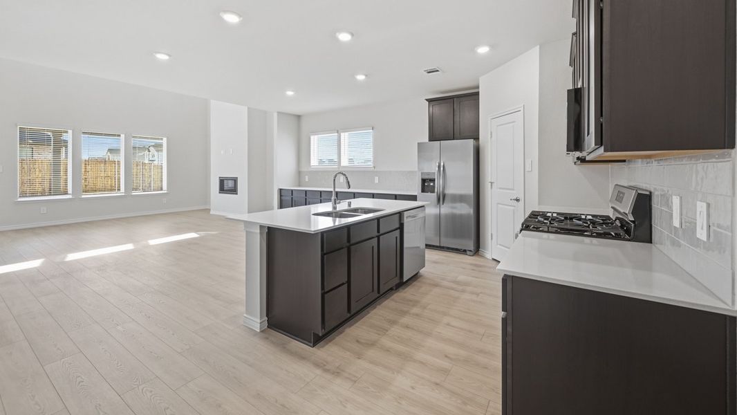 Representative furnished interior of a home built from the Oakridge by D.R. Horton in Morning Ridge, Princeton (Image 6).