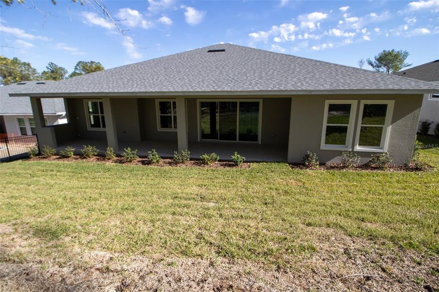 Exterior details and patio area of a home in , Brooksville (Image 28).