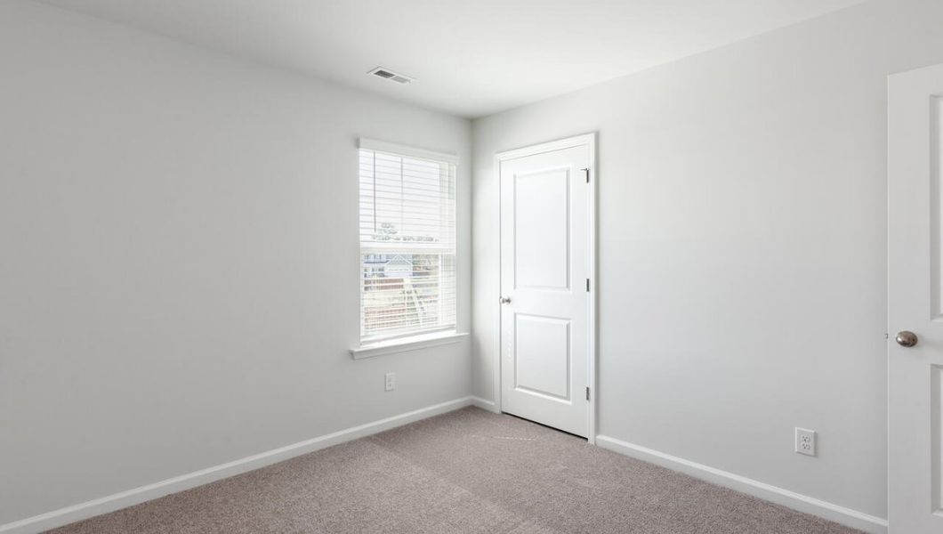 Spacious, unfurnished interior of a new home in Grayson Park, Leland (Image 32).