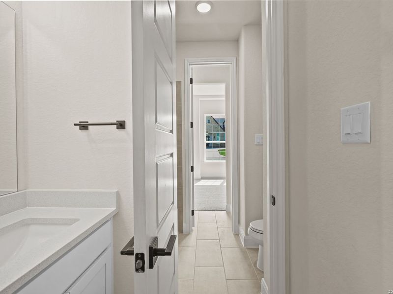 Furnished interior view inside a new home in Potranco Oaks, Castroville (Image 18).