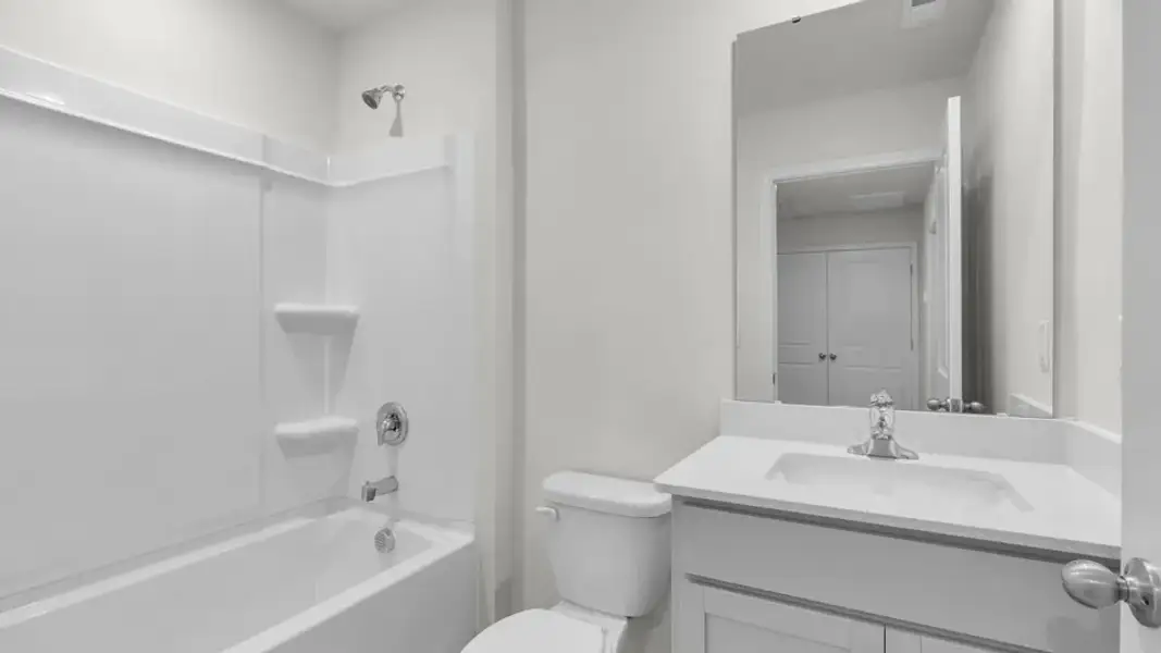 Furnished interior view inside a new home in The Townes at Prestleigh, Wake Forest (Image 10).