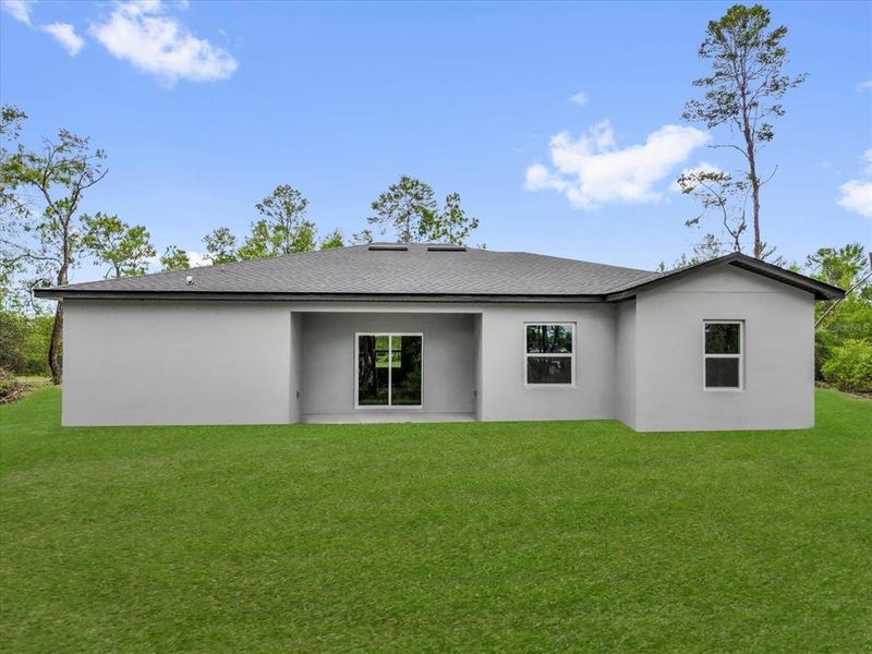 Front exterior of a new home in , Ocala, FL, highlighting curb appeal (Image 2).