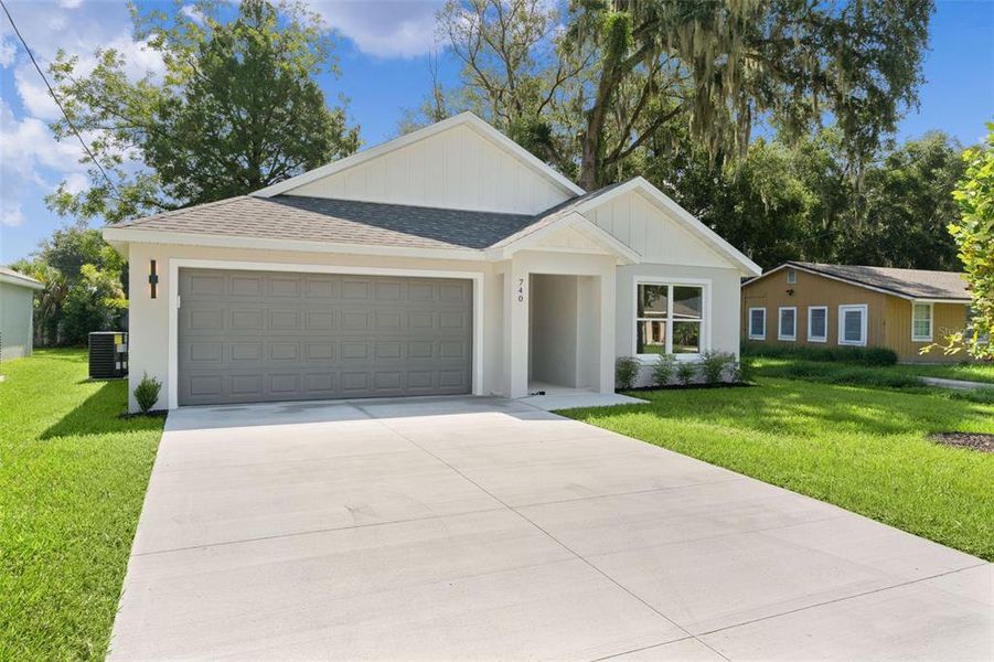 Front exterior of a new home in , Wildwood, FL, highlighting curb appeal (Image 24).