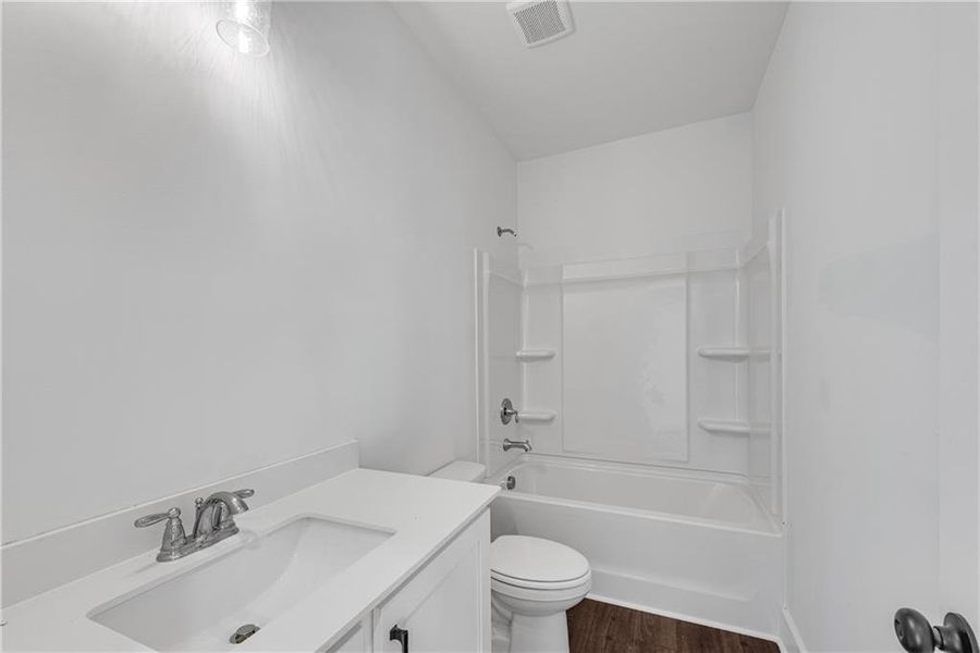 Furnished interior view inside a new home in , Suwanee (Image 11).