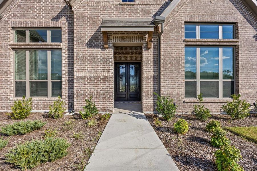 Exterior details and patio area of a home in Tuscan Estates (1 Acre Lots), Waxahachie (Image 4). Exterior details and patio area of a home in Tuscan Estates (1 Acre Lots), Waxahachie (Image 4).