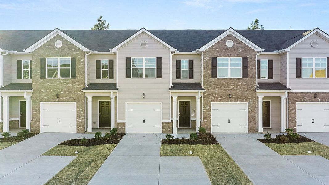 Front exterior of a new home in Laurel Park Townhomes, Hephzibah, GA, highlighting curb appeal (Image 2).
