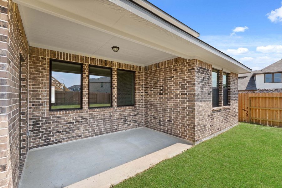 The covered patio is perfect for your outdoor living space, patio furniture, bbq pit and so much more.